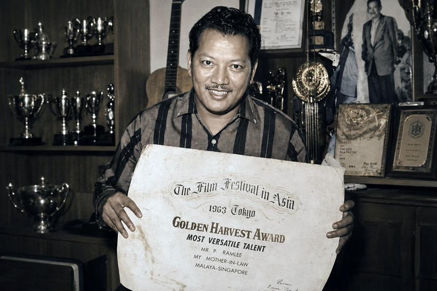 P. Ramlee with an award