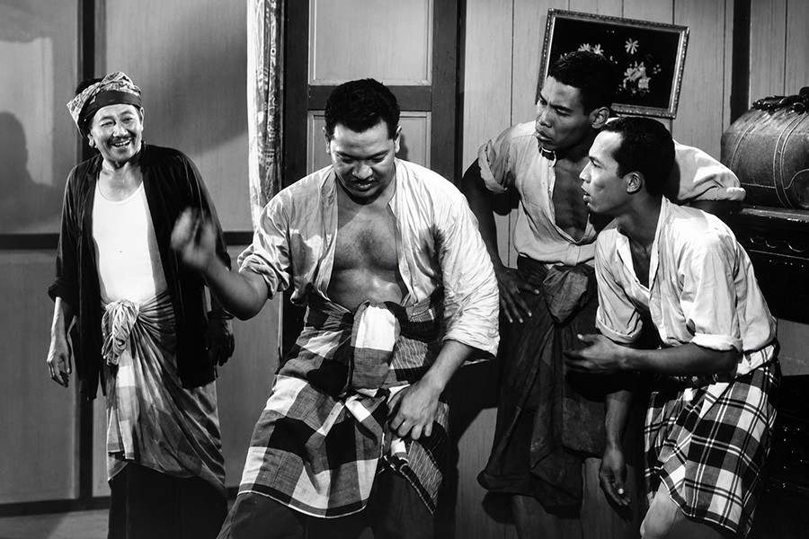 Ramlee, Aziz, Sudin and a fellow tenant, Bujang Lapok