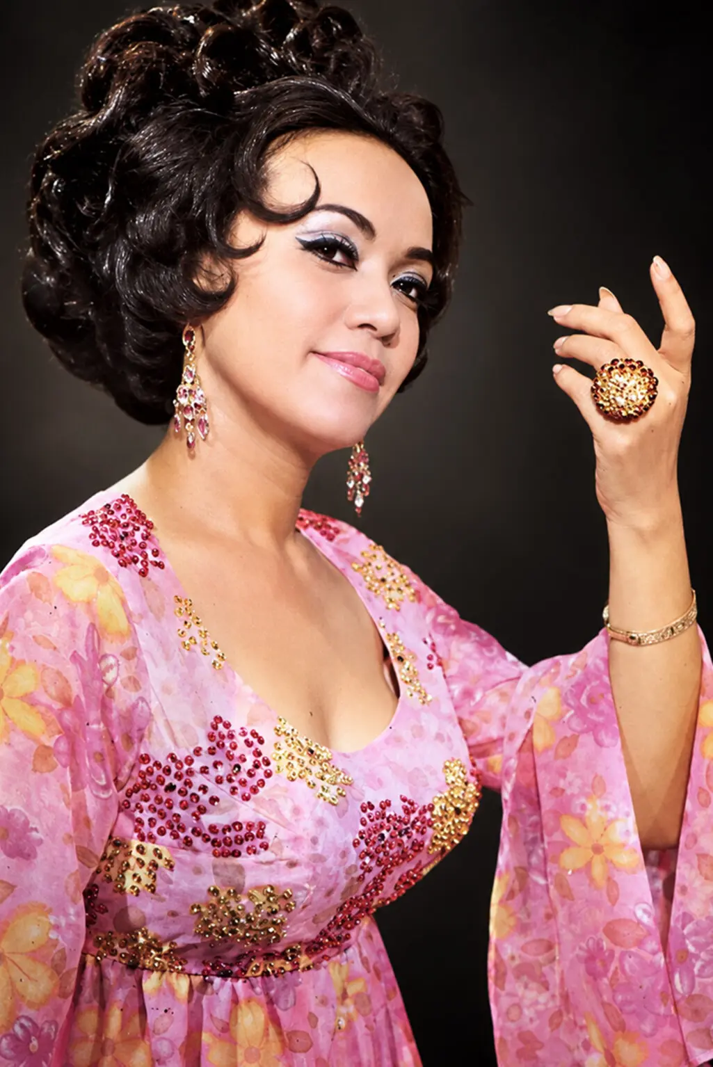 Colour studio portrait of Saloma in an embellished performance dress
